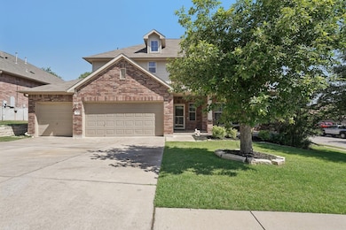 View of front of property with an attached garage