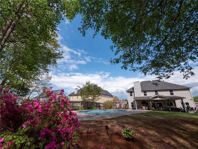Pool featuring fence and a patio