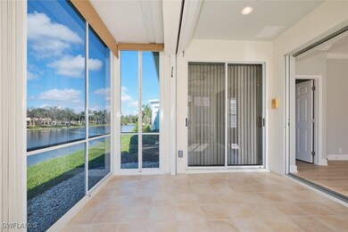Unfurnished sunroom with a water view and beam cei