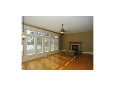 Long Span of Windows overlooking Serene Lake
