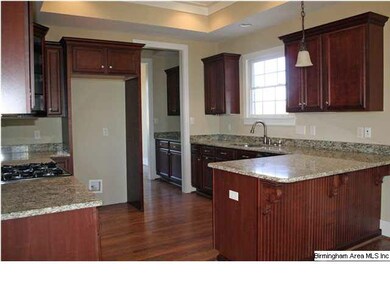 Gorgeous kitchen with custom cabinets, granite cou