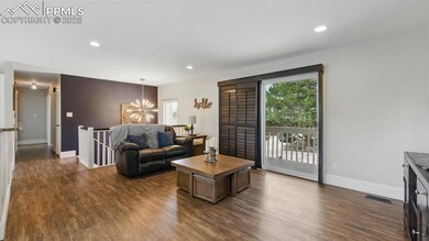 Great Room with sliding doors to a front deck with amazing mountain views.