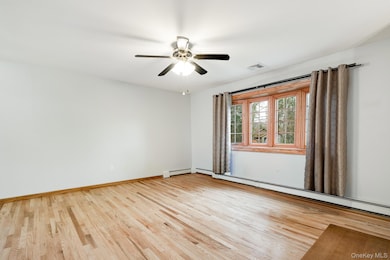 Living Room Beautiful Hardwood Floors and Custom Bow Window