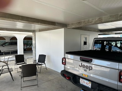 Parking and storage shed