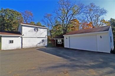 Horse barn, garage, and workshop
