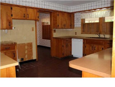 Kitchen with chopping block counter tops. AMAZING.