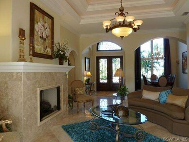 Formal Living area facing foyer and formal dining 