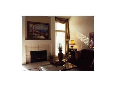 Living Room with lots of natural light, fireplace 
