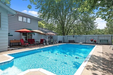 Enjoy your very own in-ground, heated pool all summer long! There is ample space for patio furniture to lounge on when you're not cooling off in the pool.