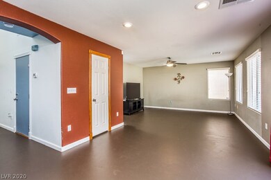 Large living room with lots of natural light and c