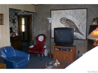 View of Living Room to hall to the kitchen, bathro