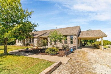 Ranch-style home featuring roof with shingles, a c