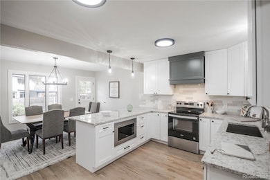 9007 E Floyd Place, Denver, CO 80231 - photo 4