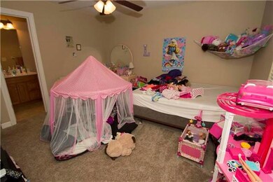 Upstairs, you will find all three bedrooms. The sp