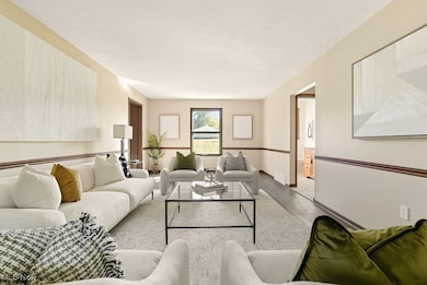 Living room featuring wood finished floors