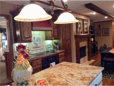 Kitchen open to hearth room for cozy family meals.