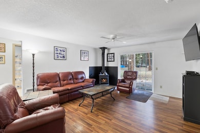 living room with wood stove