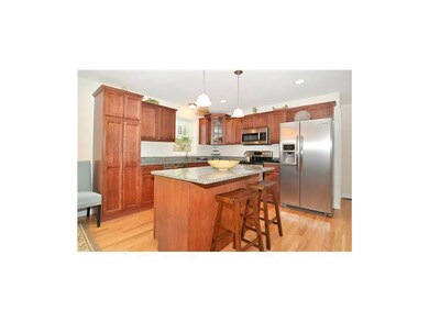 Kitchen. Granite counters and hardwood floors add