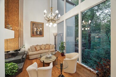Expansive windows offer breathtaking views.