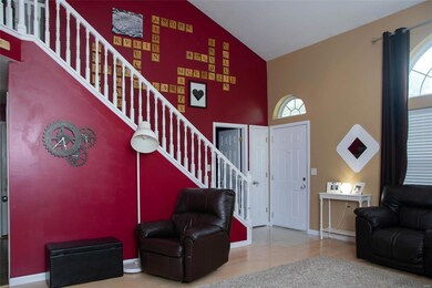 Open 2 story foyer with open staircase!