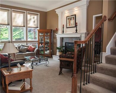 Nice sized living room with beautiful windows and 