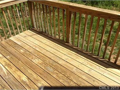 Deck - Decks on front and rear of this home
