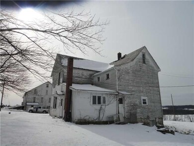 Exterior Back. Back of house, barn across the road