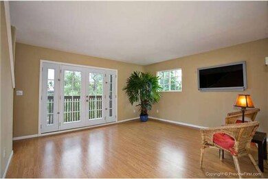 Living Room With New Flooring, Designer Paint Colo