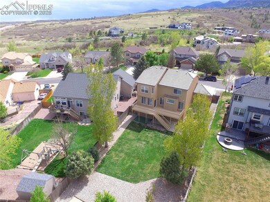 Aerial view of residential area with a mountainous background