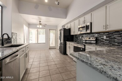 Kitchen opens to Front Courtyard, Patio