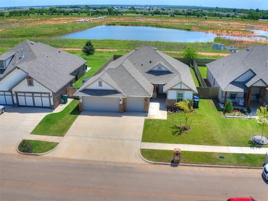 View from above of property with a large body of water