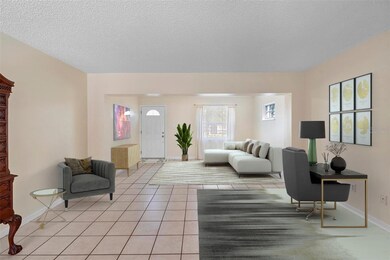Virtually staged grand living room.
