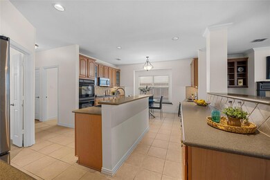 Kitchen featuring appliances with stainless steel 
