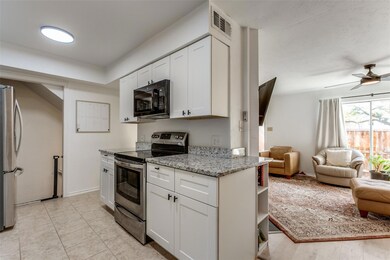 Kitcheb ib close proximity to dining and living
