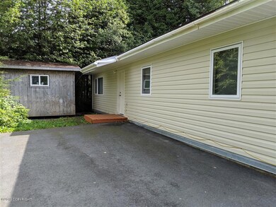 driveway, front door and shed