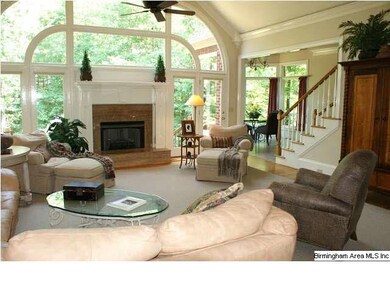 Family room/open & airy with raised hearth, ventle