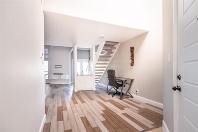 Office featuring light wood-style floors and baseb