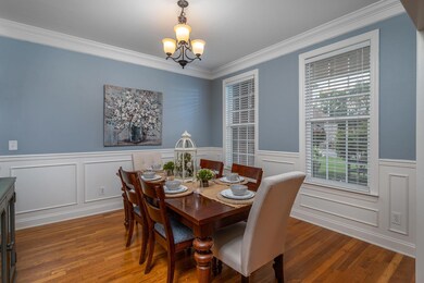 BEAUTIFUL, FORMAL DINING ROOM WELCOMES YOU AS YOU ENTER THROUGH THE FRONT DOOR!