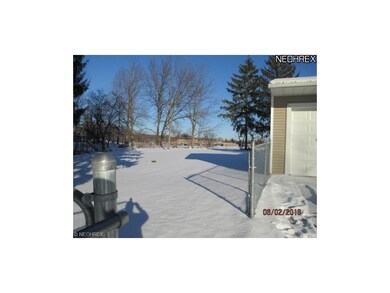 large 1 acre lot completely fenced in.