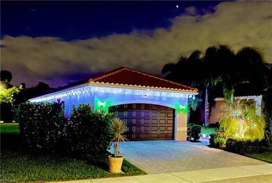 Mediterranean / spanish home featuring a garage