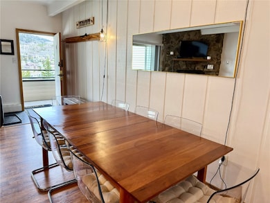 Dining area with wood finished floors