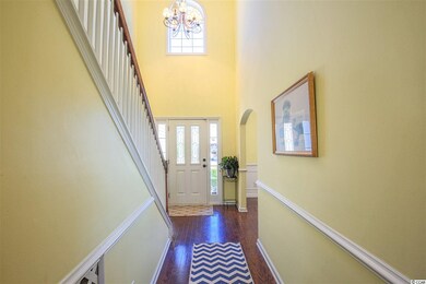 Beautiful soaring ceilings in the front entrance