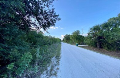 1.25 acre on the left.  Looking north.