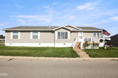 1710 35th St W, Williston, ND 58801 - photo 2