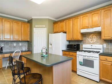 Kitchen with great cabinet space, lg island and pantry.
