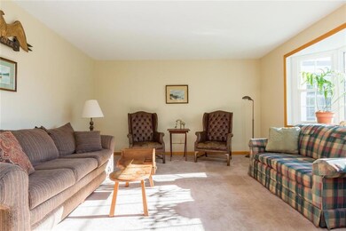 Front living room w/ bay window...