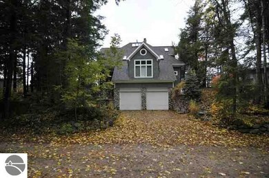 Two-car attached drive under garage. Home is built