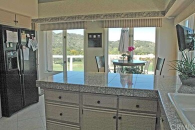 Lots of extra cabinets on opposite wall.
