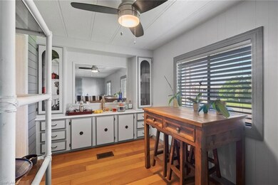 Dining area featuring a textured ceiling and light
