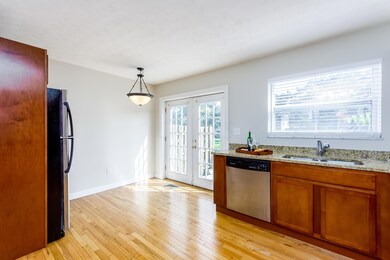 Kitchen with atrium door to patio
